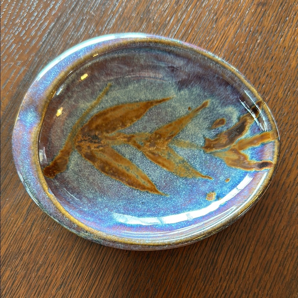 Pottery bowl ashtray. Really pretty, oval, w blues purple & brown bamboo design